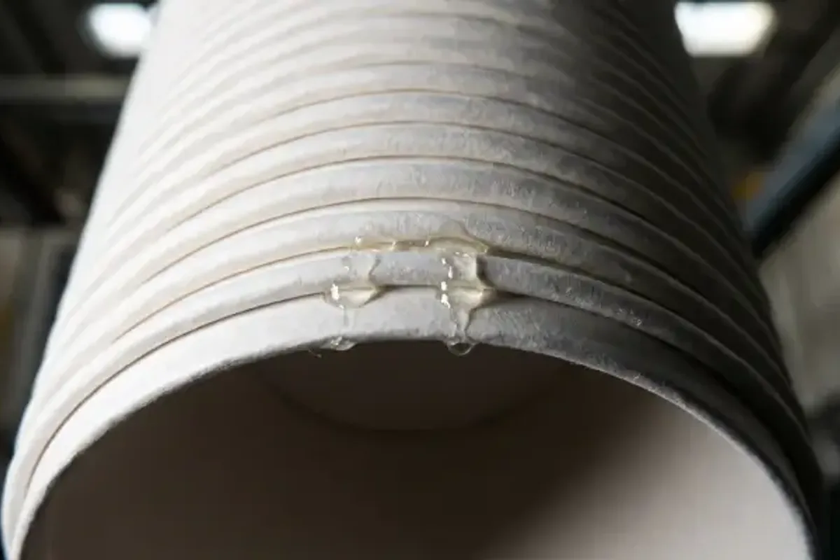 Paper cup stacking-blocking defect after forming on coated stock